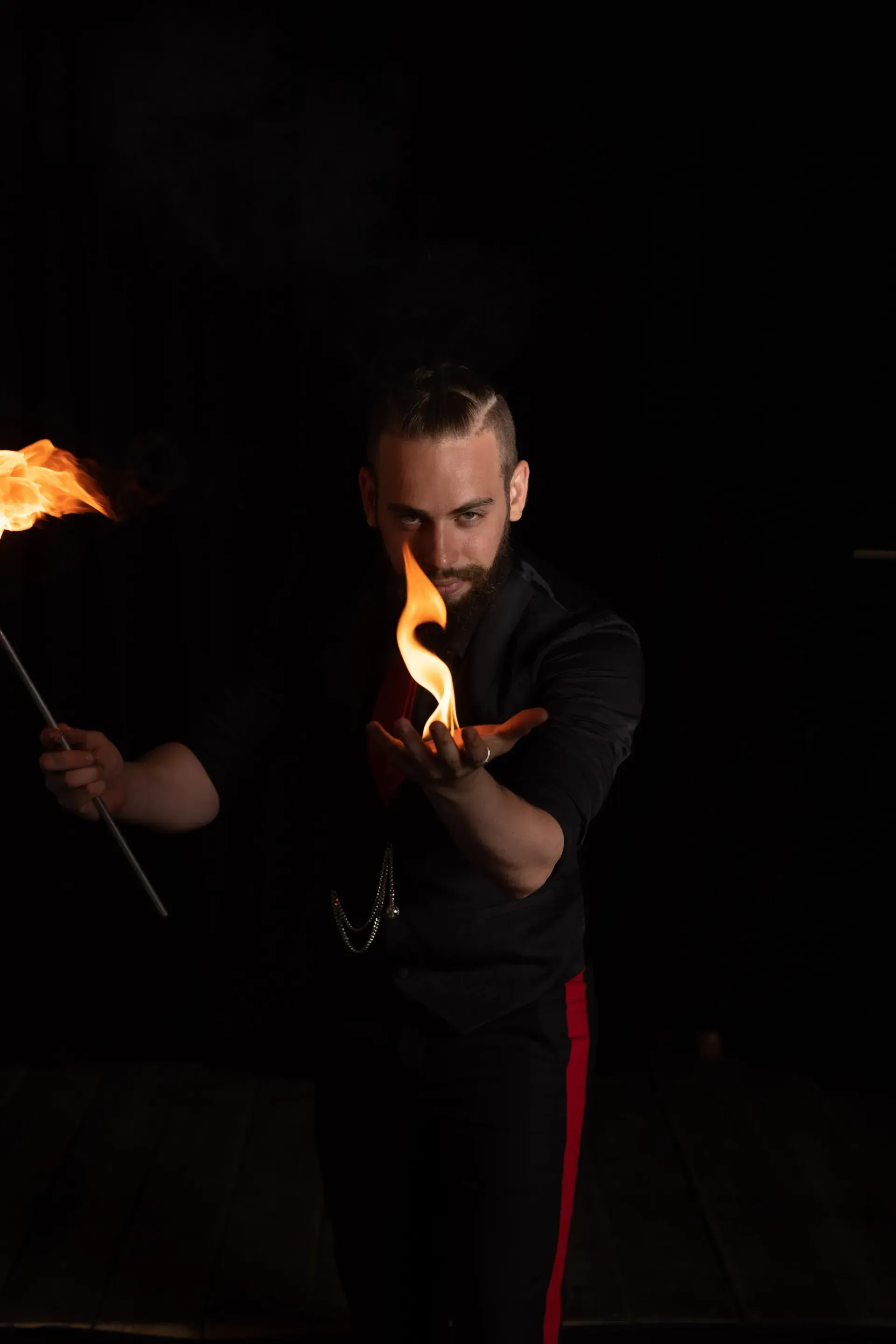 Lior Littman holding a flame