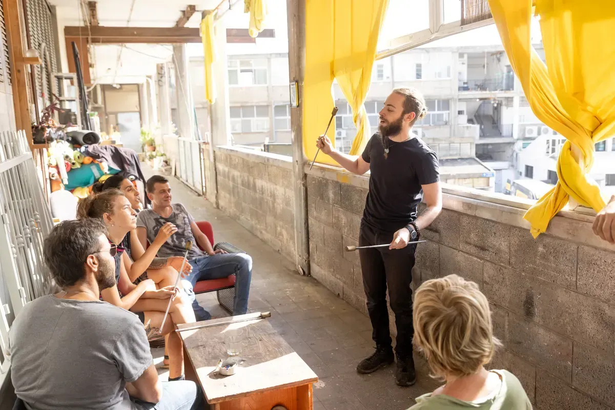 Lior teaching a small group